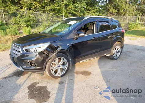 2017 Ford Escape Titanium from USA, damaged, VIN 1FMCU9J93HUA73463